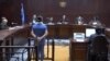 Uno de los acusados comparece ante el tribunal. (Captura de video/Canal Caribe)