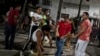 FOTOGALERÍA Imágenes de la represión a manifestantes pacíficos que gritaban ¡Libertad! en una calle de La Habana