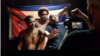 Maykel El Osorbo, uno de los raperos detenidos en Cuba, junto al artista Luis Manuel Otero Alcántara y el también cantante de hip hop, El Funky, en el rodaje de "Patria y Vida".