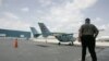 José Basulto, de Hermanos al Rescate, camina hacia una de las avionetas de la organización.