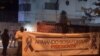Los manifestantes portaban carteles reclamando libertad para el líder de UNPACU José Daniel Ferrer y en memoria de Armando Sosa Fortuny.