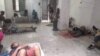 Miembros del Movimiento San Isidro en huega de hambre descansan sobre el suelo en La Habana Vieja.