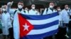 M[edicos cubanos llegan a Honduras, el 19 de abril. AFP PHOTO / HONDURAN PRESIDENCY