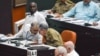 Raúl Castro con "Amadito Rodríguez" conversando en la Asamblea Nacional del PP