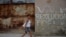 A woman walks along a street in Havana on April 18, 2018 as the National Assembly holds a session that will select Cuba's Council of State ahead of the naming of a new president. - Cuban President Raul Castro steps down Thursday, passing the baton to a ne