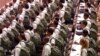Médicos cubanos listos en formación militar para ir a misión. Foto Archivo.