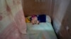 La cama de Mackyanis Yosney Roman Rodríguez, encarcelada junto a sus dos hermanos por participar en las protestas de La Güinera.