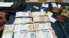 El dinero y la documentación encontrada en poder de los cubanos detenidos en El Alto.