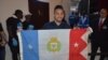 El boxeador cubano Robeisy Ramírez con la bandera de la provincia de Cienfuegos, en el centro de la isla.