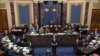 El presidente de la Comisión de Inteligencia de la Cámara de Representantes, Adam Schiff, habla el martes ante el pleno del Senado en la primera sesión del juicio político al presidente Donald Trump.