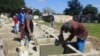 Labores de ampliación del cementerio de Kilo 12, en Sacti Spíritus, ante el incremento de muertes por COVID-19. (Captura de imagen/Escambray)