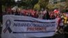 Pancarta sobre Armando Sosa Fortuny, durante marcha en Santiago de Chile. (Foto cortesía)