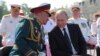 El Presidente ruso Vladimir Putin y el ministro de Defensa Sergei Shoigu. Foto Archivo.